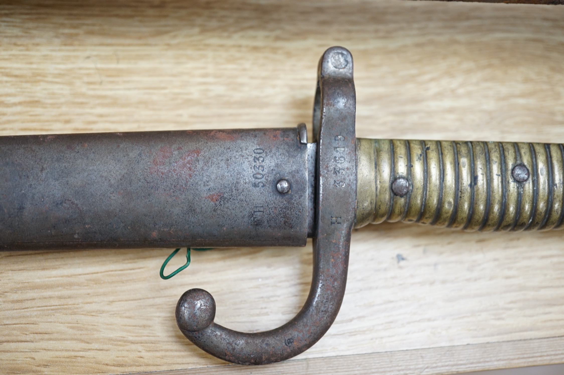 An early pike, a basket hilt sword and a French bayonet. longest 193cm